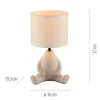 LED Tischleuchte beige Männchen sitzend Stoffschirm mit Schnurschalter