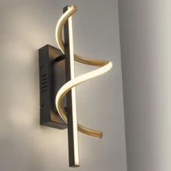 LED Wandleuchte schwarz messing dimmbar in 3 Stufen geschwungen